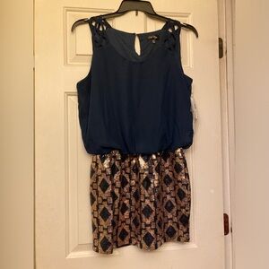 Love Reign, size large, new with tags, cute, sparkly dress. Pretty and comfy